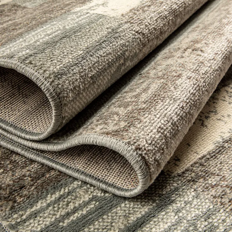8' Light Blue And Ivory Patchwork Power Loom Stain Resistant Runner Rug
