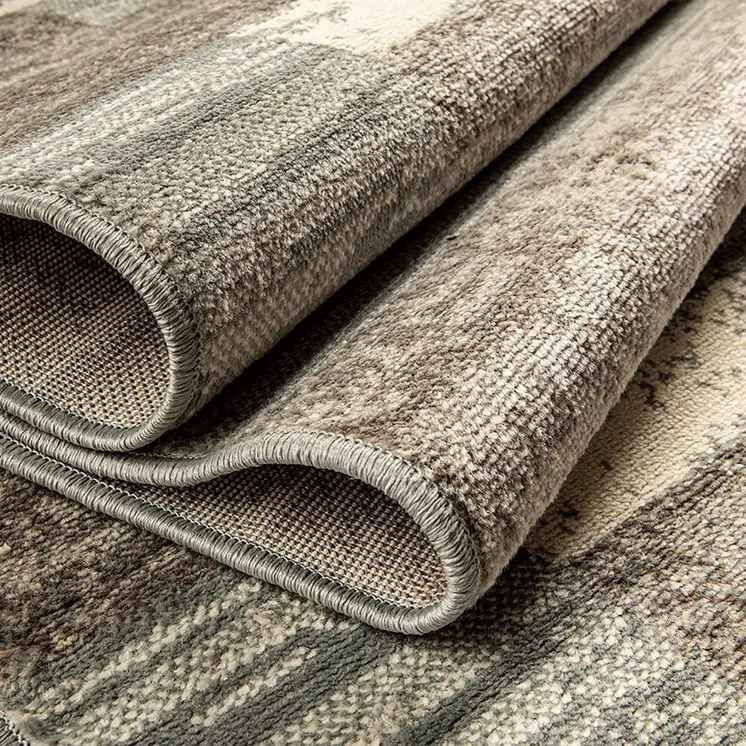 5' X 8' Light Blue And Ivory Patchwork Power Loom Stain Resistant Area Rug