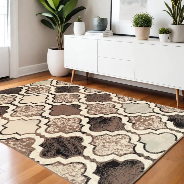 5' X 8' Ivory Quatrefoil Power Loom Distressed Stain Resistant Area Rug