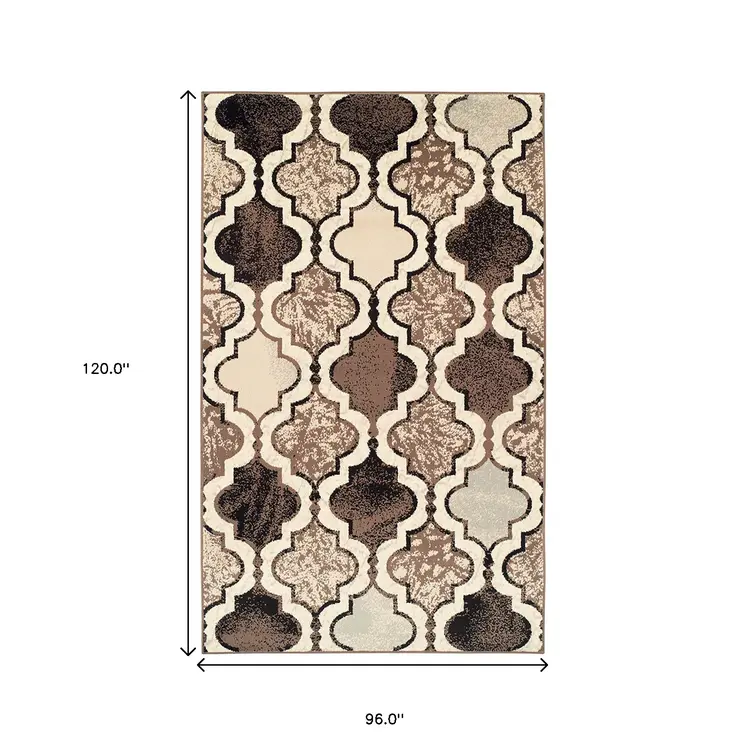 8' X 10' Ivory Quatrefoil Power Loom Distressed Stain Resistant Area Rug
