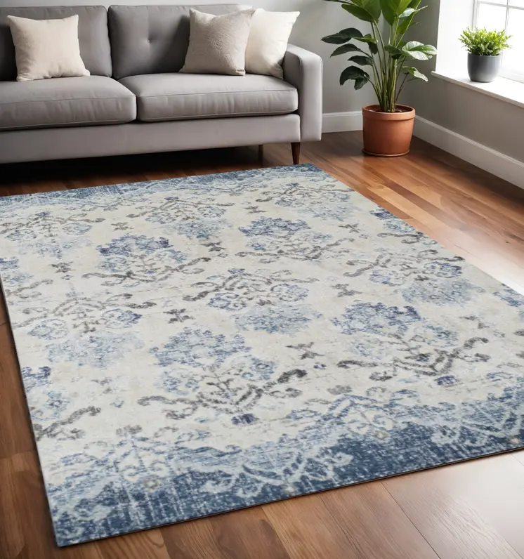 5' X 8' Blue and Ivory Oriental Area Rug