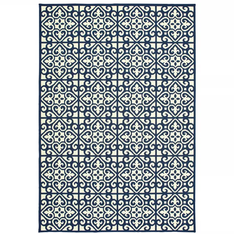 7' X 10' Ivory and Blue Geometric Stain Resistant Indoor Outdoor Area Rug