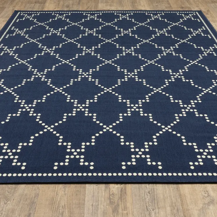 2' X 4' Blue and Ivory Geometric Stain Resistant Indoor Outdoor Area Rug