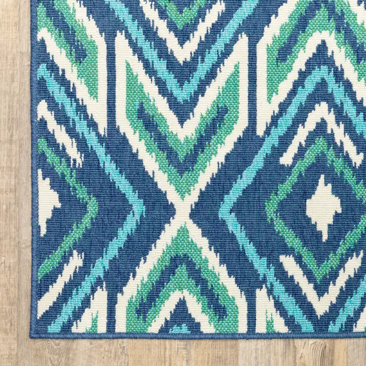 2' X 8' Blue and Ivory Geometric Stain Resistant Indoor Outdoor Area Rug
