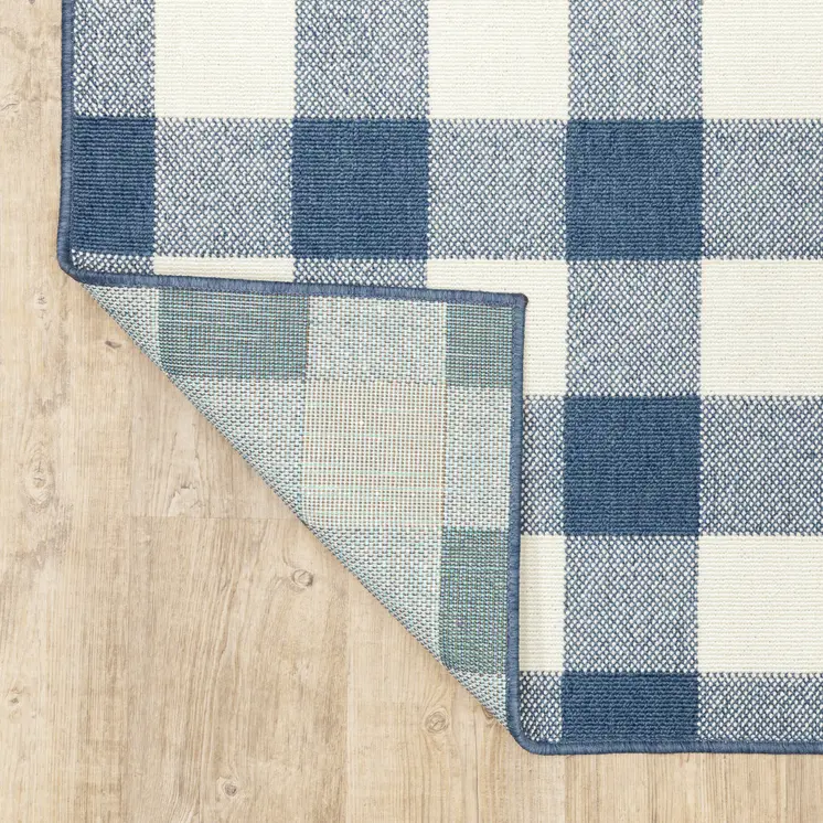 5' X 8' Blue and Ivory Geometric Stain Resistant Indoor Outdoor Area Rug
