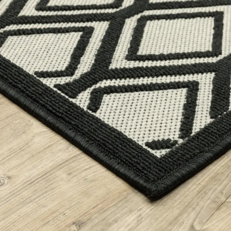 10' X 13' Beige and Black Geometric Stain Resistant Indoor Outdoor Area Rug