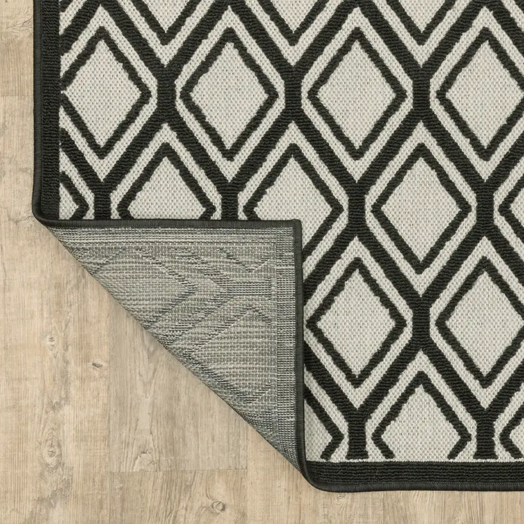 10' X 13' Beige and Black Geometric Stain Resistant Indoor Outdoor Area Rug