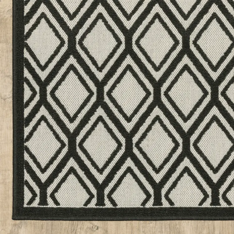 10' X 13' Beige and Black Geometric Stain Resistant Indoor Outdoor Area Rug
