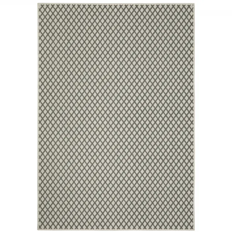 7' X 9' Beige Geometric Stain Resistant Indoor Outdoor Area Rug