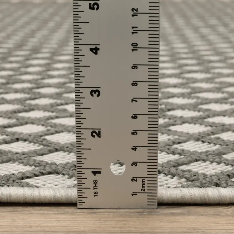 7' X 9' Beige Geometric Stain Resistant Indoor Outdoor Area Rug