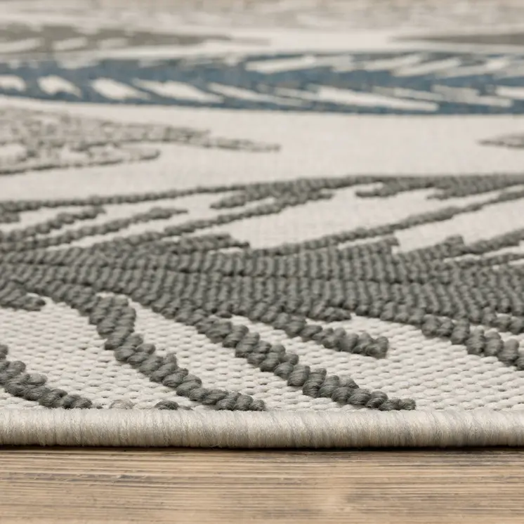 7' X 9' Beige Floral Stain Resistant Indoor Outdoor Area Rug