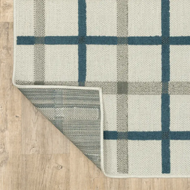 7' X 9' Blue and Beige Geometric Stain Resistant Indoor Outdoor Area Rug