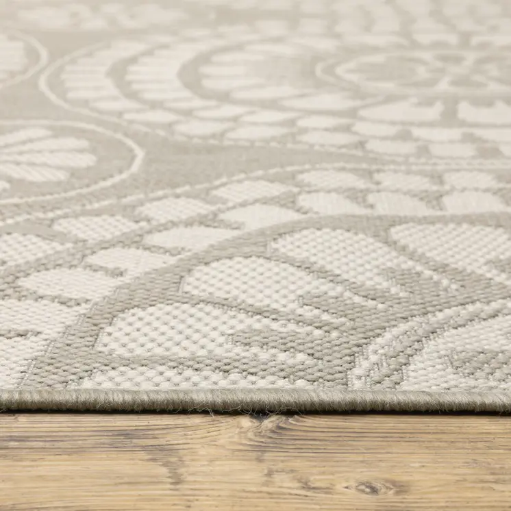 7' X 9' Gray and Ivory Geometric Stain Resistant Indoor Outdoor Area Rug