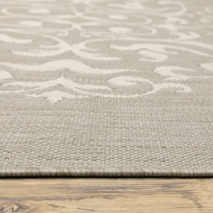 7' X 9' Gray and Ivory Oriental Stain Resistant Indoor Outdoor Area Rug
