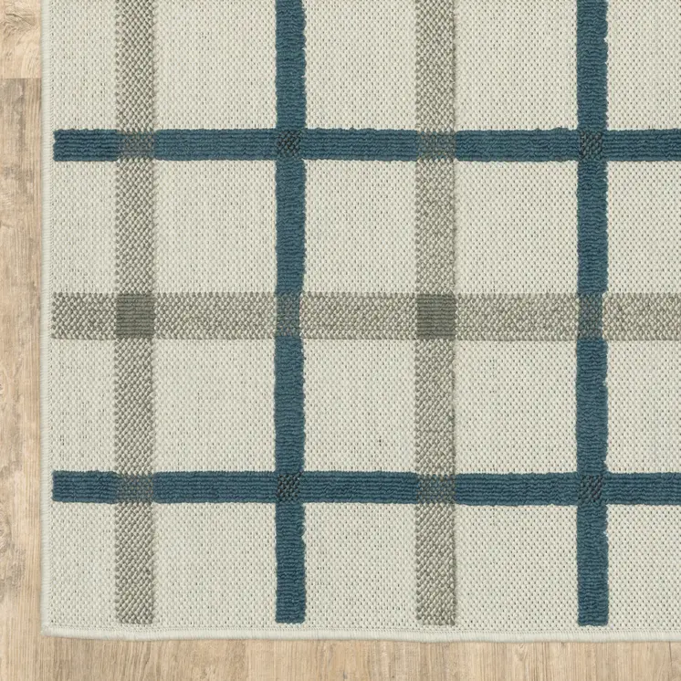 2' X 4' Blue and Beige Geometric Stain Resistant Indoor Outdoor Area Rug