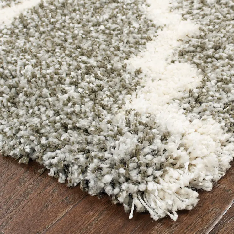5' X 8' Grey And Ivory Geometric Shag Power Loom Stain Resistant Area Rug
