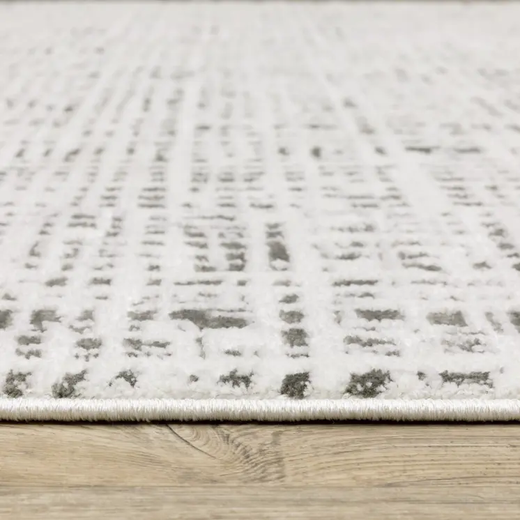 7' X 10' White And Gray Abstract Distressed Area Rug