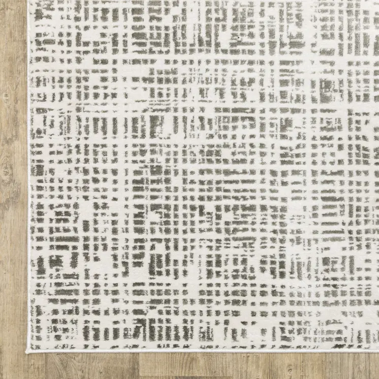 8' X 11' White And Gray Abstract Distressed Area Rug