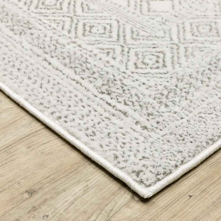 7' X 10' White And Gray Oriental Distressed Area Rug