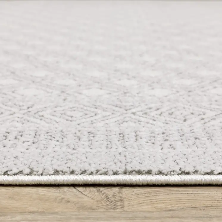7' X 10' White And Gray Oriental Distressed Area Rug
