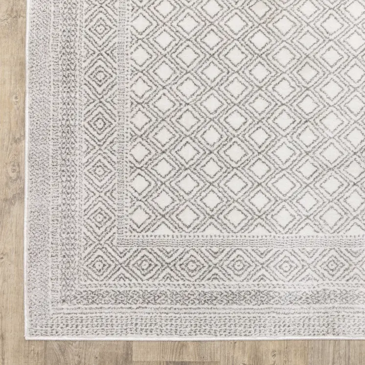 10' X 13' White And Grey Oriental Power Loom Stain Resistant Area Rug