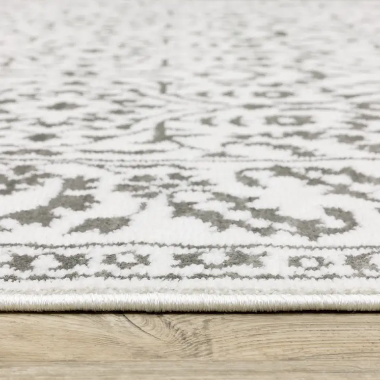 7' X 10' Gray And White Floral Distressed Area Rug