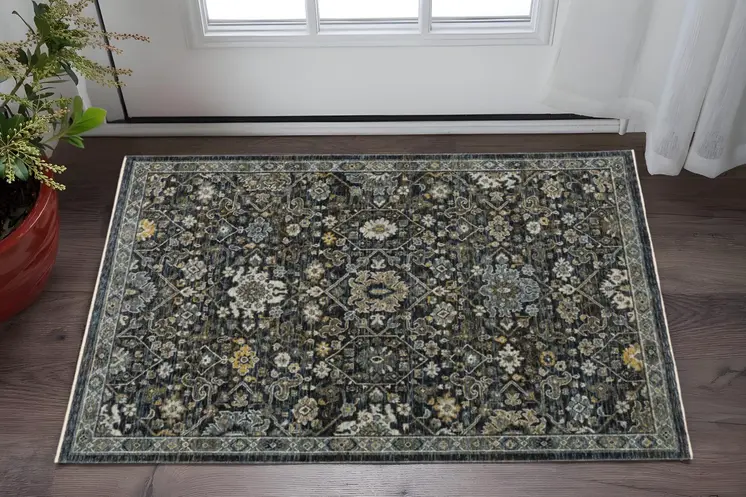 2' X 3' Blue Ivory Grey Gold Green And Brown Oriental Power Loom Stain Resistant Area Rug With Fringe