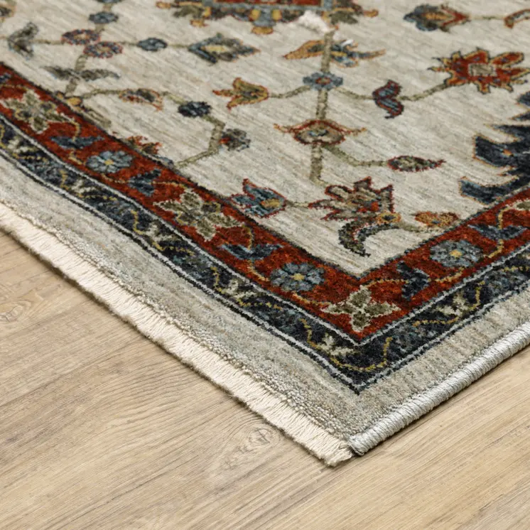 10' X 13' Beige Rust Red Blue Gold And Grey Oriental Power Loom Stain Resistant Area Rug With Fringe