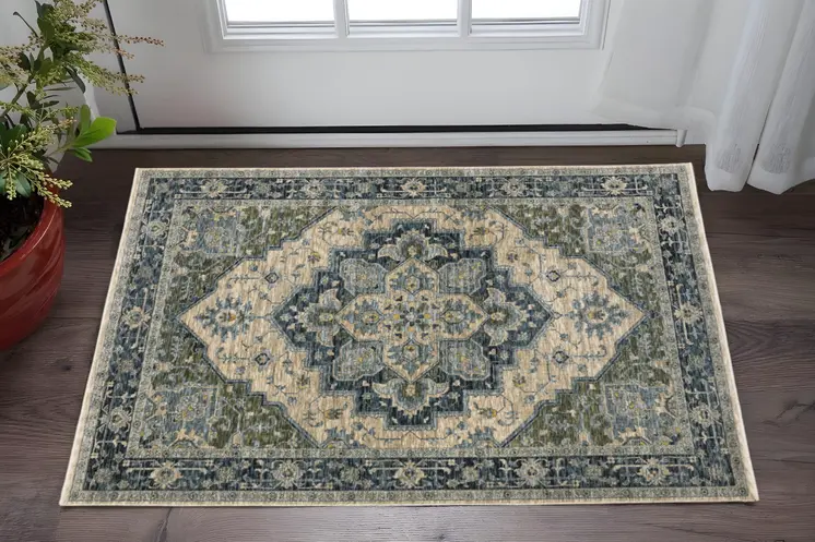 3' X 5' Blue Grey Beige Tan Green And Gold Oriental Power Loom Stain Resistant Area Rug With Fringe