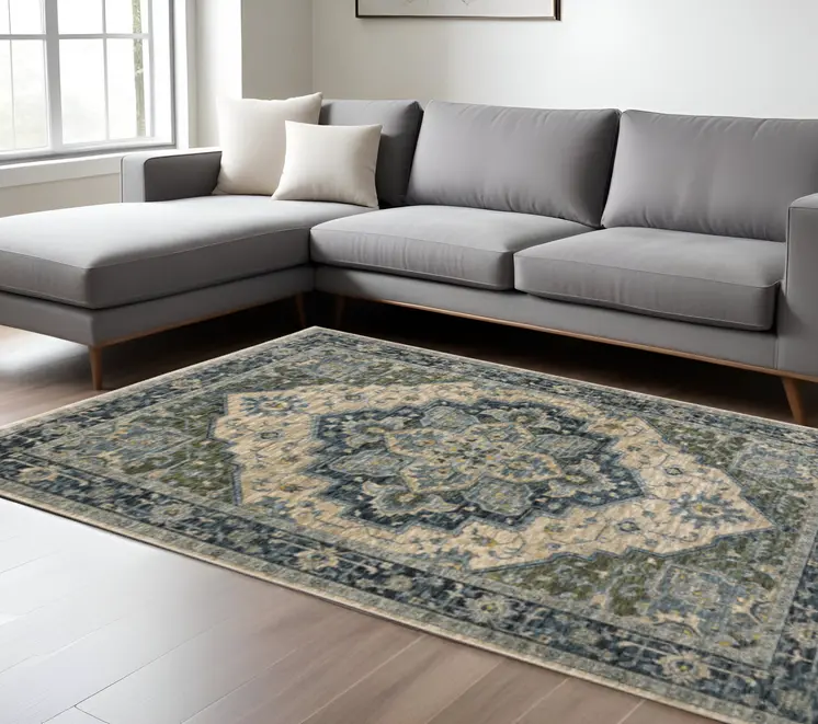 10' X 13' Blue Grey Beige Tan Green And Gold Oriental Power Loom Stain Resistant Area Rug With Fringe