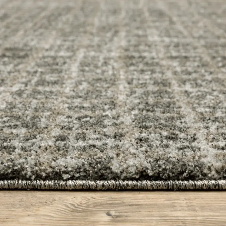 5' X 8' Brown And Beige Geometric Distressed Area Rug