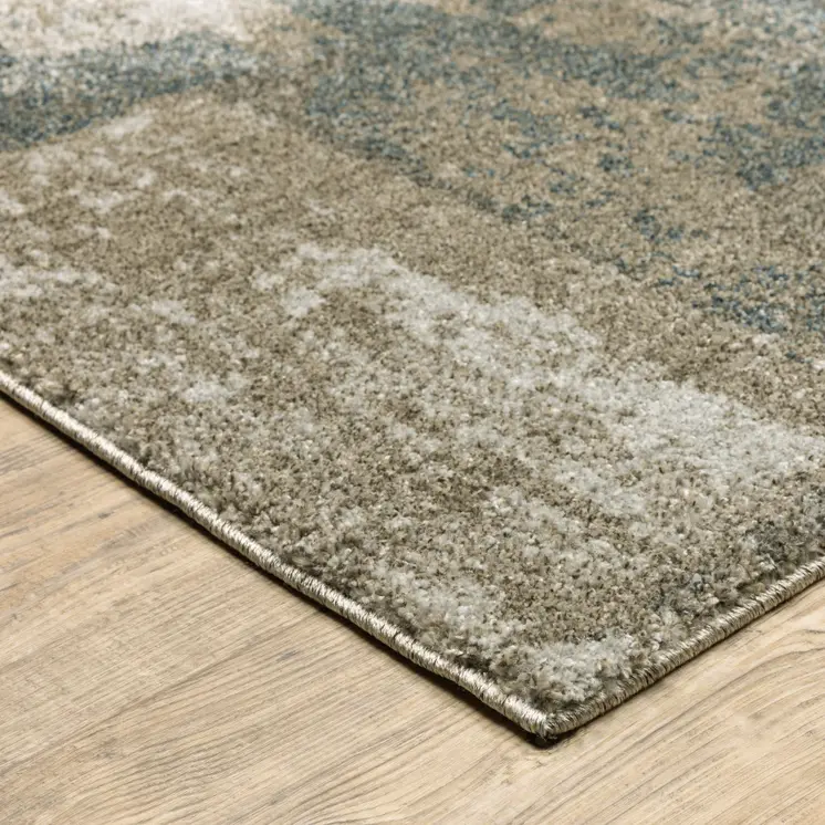 7' X 10' Teal Blue Geometric Power Loom Area Rug