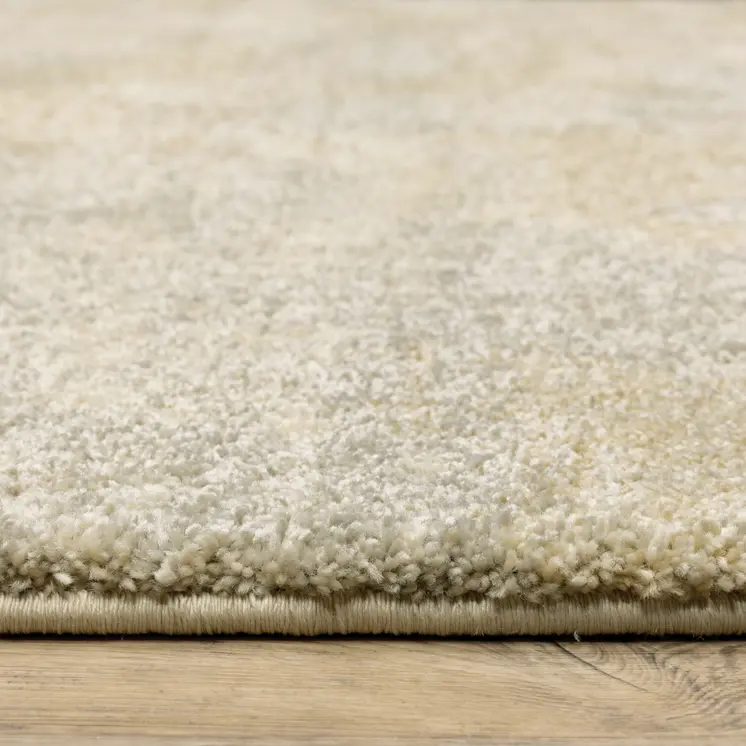 8' X 11' Grey Ivory Beige And Taupe Abstract Power Loom Stain Resistant Area Rug