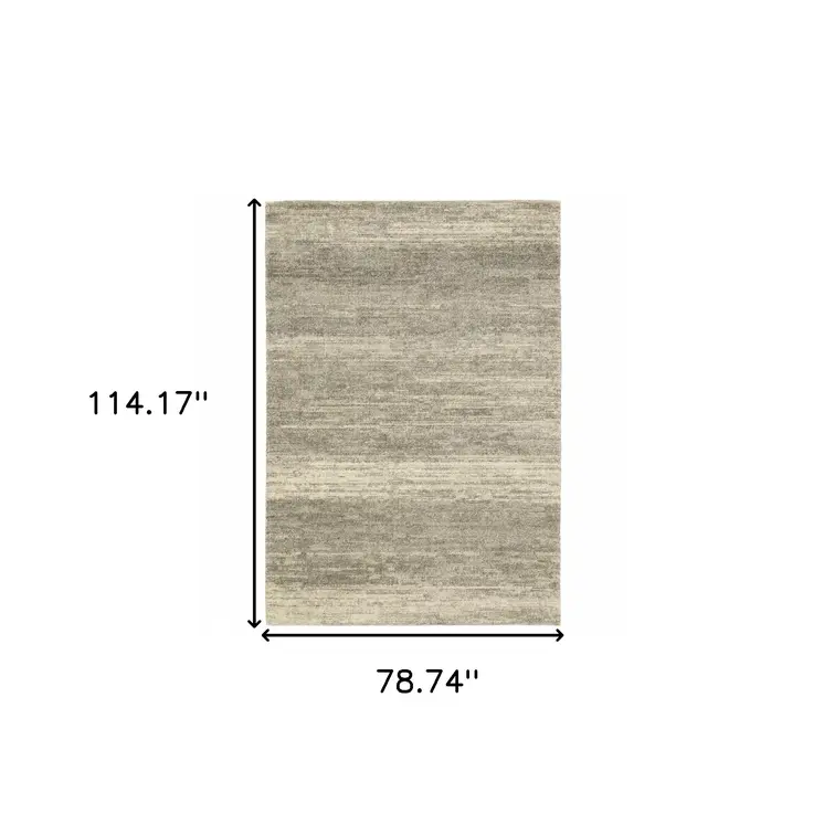 6' X 9' Grey Beige And Tan Abstract Power Loom Stain Resistant Area Rug