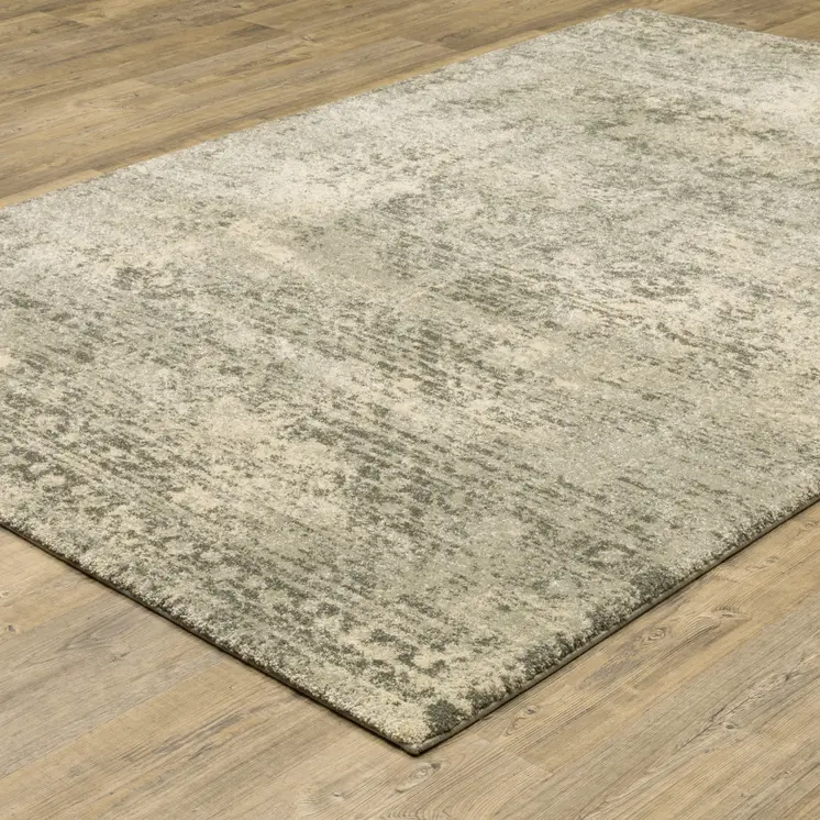 6' X 9' Grey Ivory Beige And Taupe Oriental Power Loom Stain Resistant Area Rug