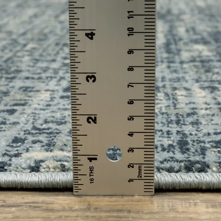 7' X 9' Blue And Beige Abstract Area Rug