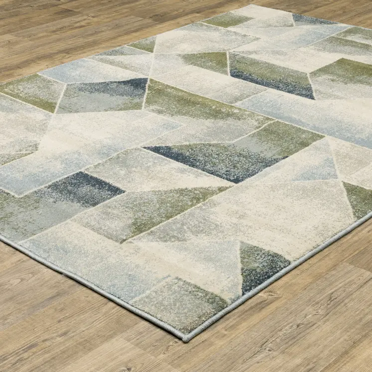 7' X 9' Gray And Ivory Geometric Area Rug