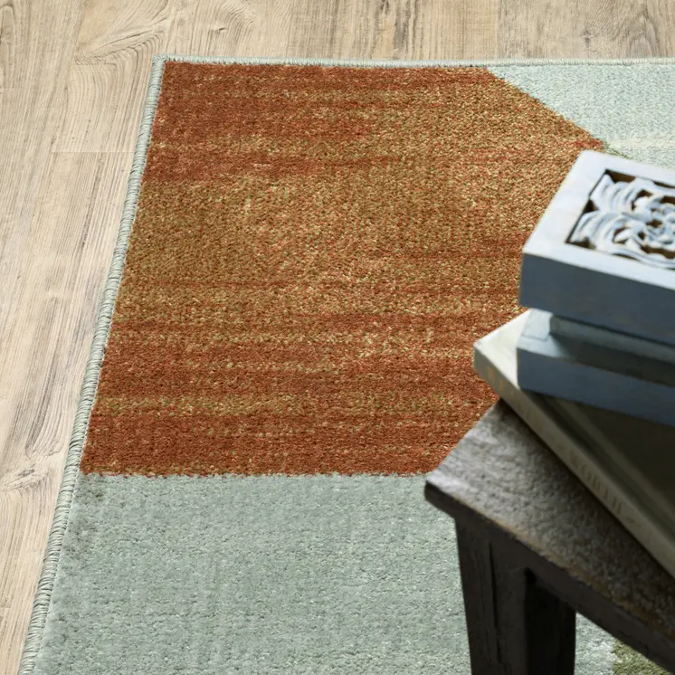 7' X 9' Gray And Ivory Geometric Area Rug