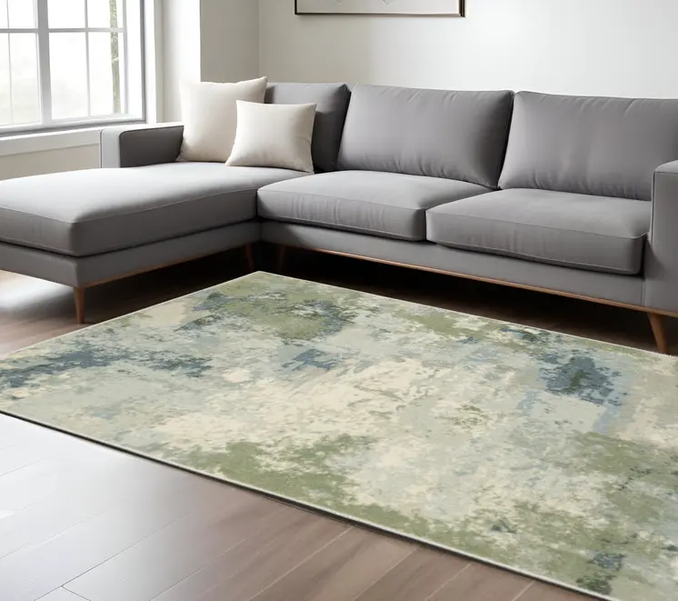 7' X 9' Green And Ivory Abstract Area Rug