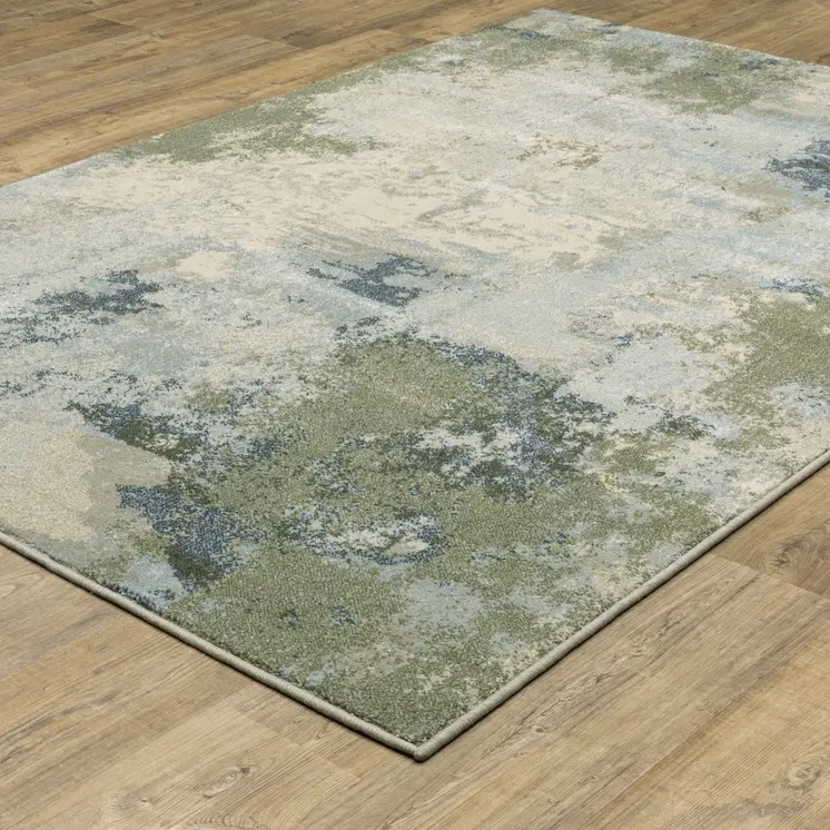 7' X 9' Green And Ivory Abstract Area Rug