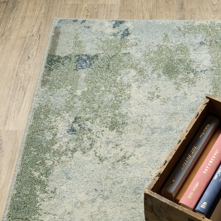 7' X 9' Green And Ivory Abstract Area Rug