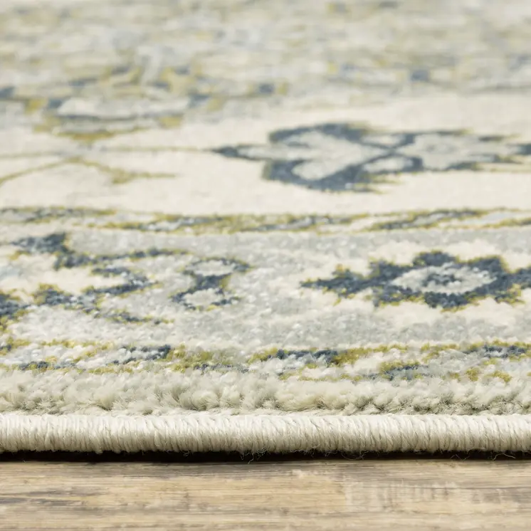 7' X 9' Ivory And Blue Oriental Distressed Area Rug