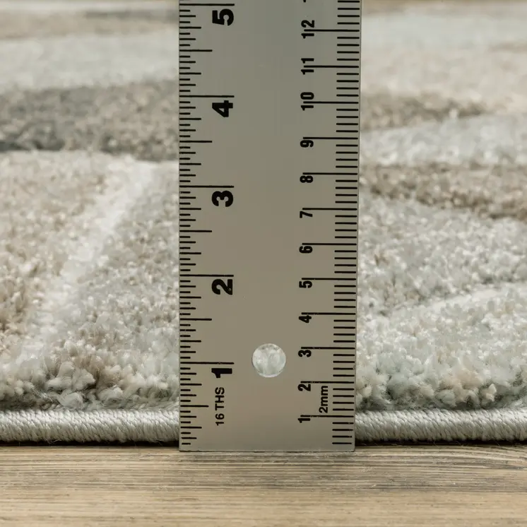 7' X 10' Gray And Ivory Geometric Area Rug