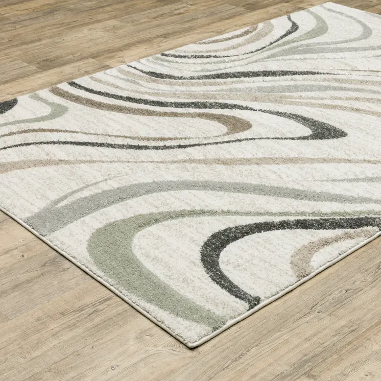 8' X 11' Beige Grey Brown Sage Pale Blue Tan And Charcoal Abstract Power Loom Stain Resistant Area Rug