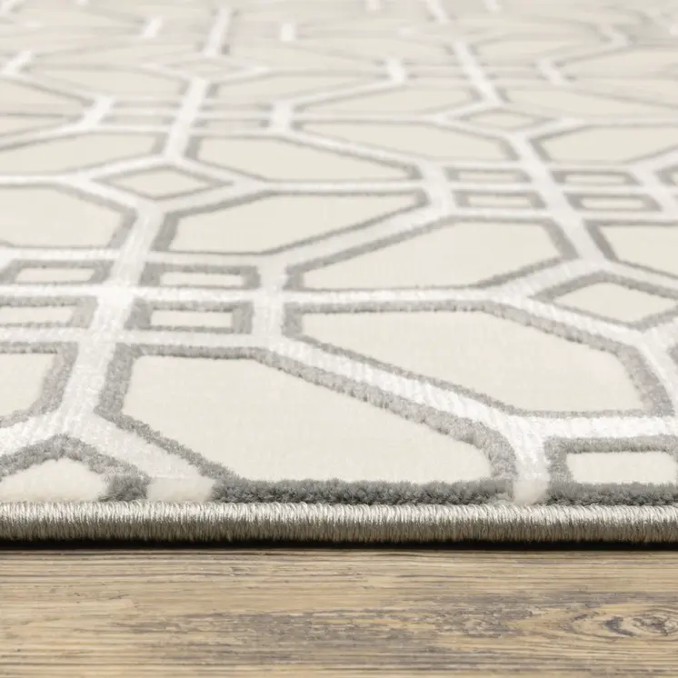 5' X 8' Ivory And Grey Geometric Power Loom Stain Resistant Area Rug