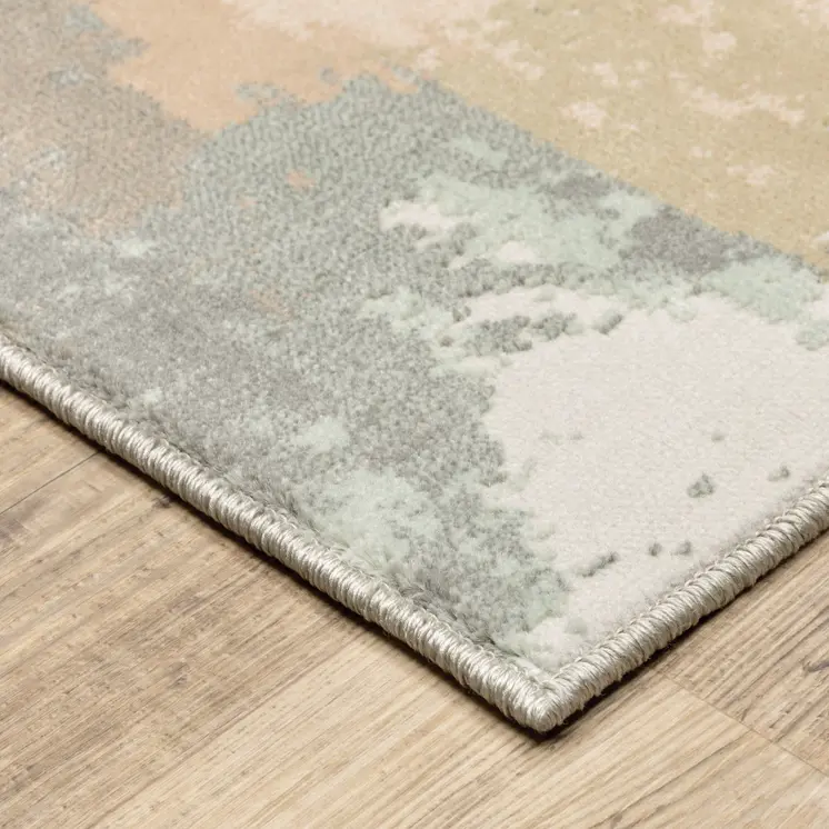 10' X 13' Pink And Cream Abstract Area Rug