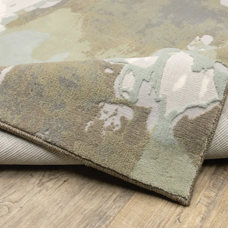7' X 10' Ivory And Green Abstract Area Rug