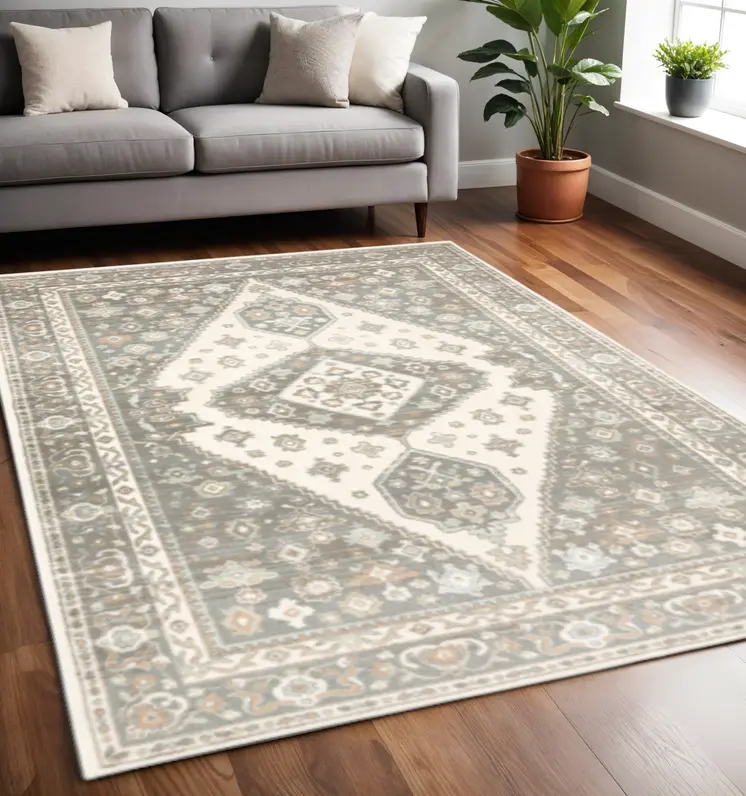 5' X 8' Grey Pink And Brown Oriental Power Loom Stain Resistant Area Rug