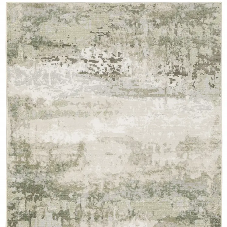 5' X 8' Beige And Green Abstract Distressed Area Rug