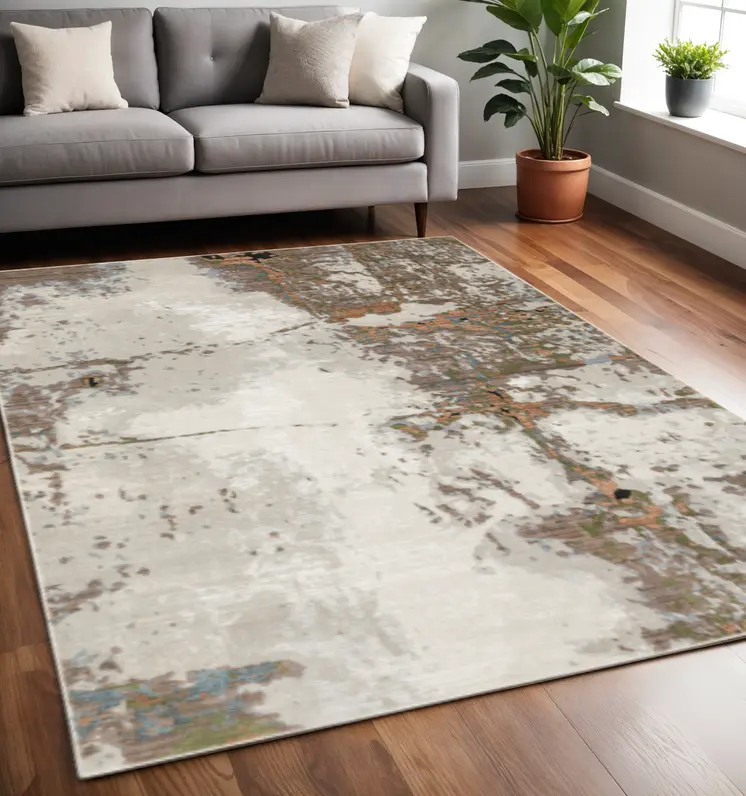 5' X 8' Grey Salmon Pink Blue Beige And Green Abstract Power Loom Stain Resistant Area Rug